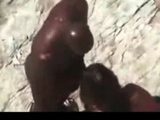 Big black dude fucking his white girlfriend at the beach